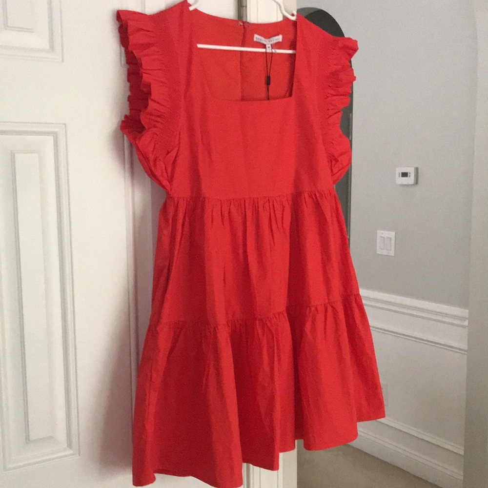 New with Tag: English Factory Ruffle Dress with Smocked Details. Size Medium
